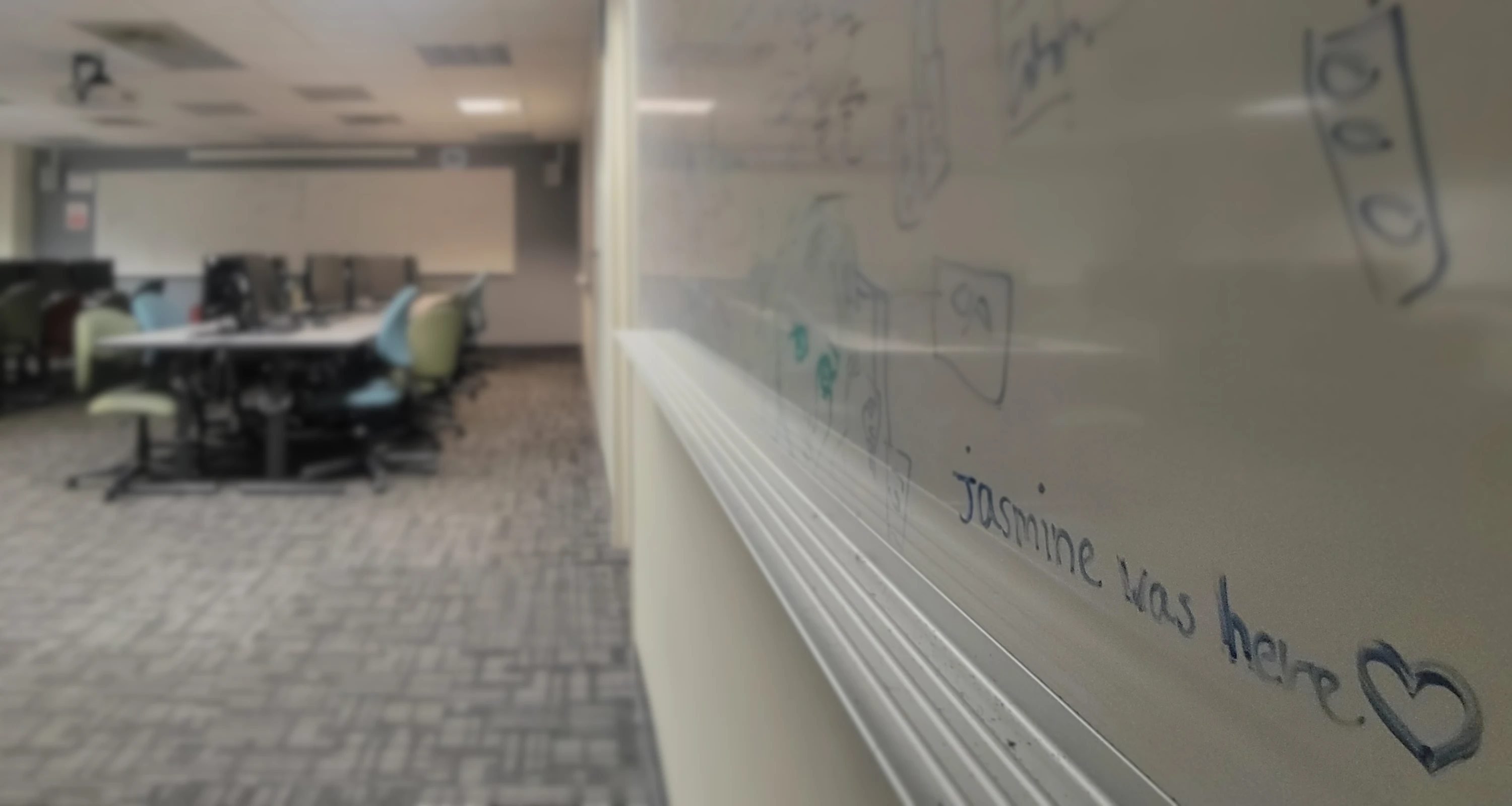 Picture of the Soda 277 lab focused on a whiteboard that says 'Jasmine was here' followed by a heart.